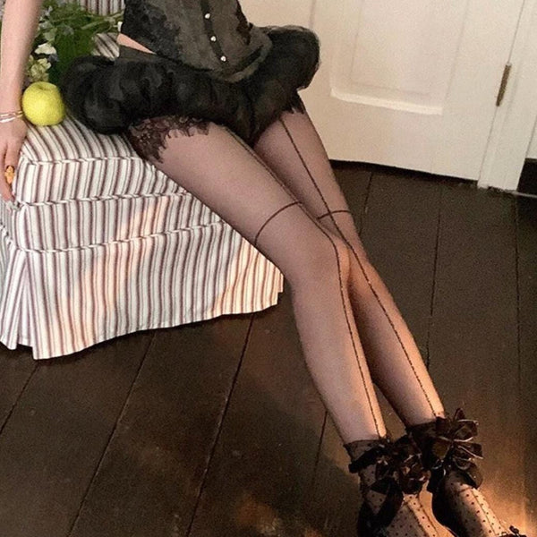 Sheer mid-calf socks featuring a velvet bow, mesh texture, and polka-dot fairy-style design