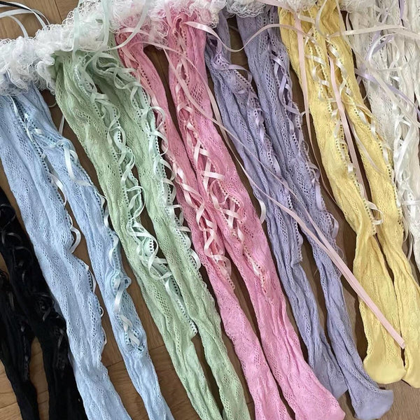 Lolita over-the-knee socks with lace trim and front lacing