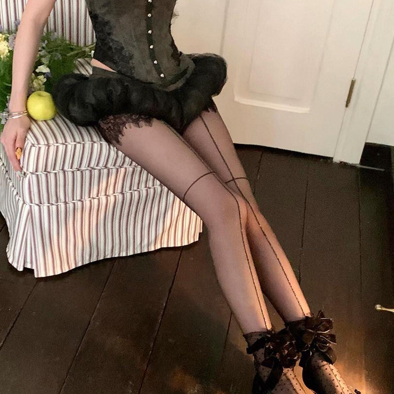 Sheer mid-calf socks featuring a velvet bow, mesh texture, and polka-dot fairy-style design